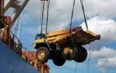 Nonpareil International Handle Challenging Export Shipment of Six Dump Trucks